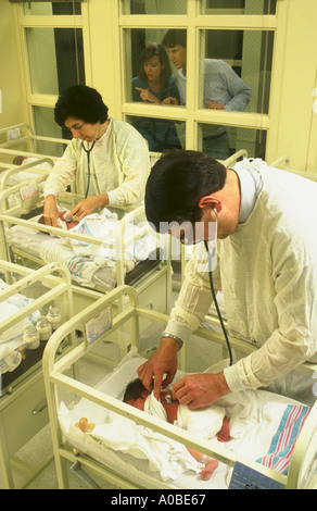 Pediatricians in nursery with newborns at Flagler hospital in St Petersburg Florida