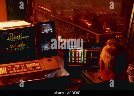 Worker uses computer to monitor steel production at Northwestern Steel in Illinois Stock Photo