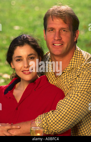 Portrait of young couple in park Stock Photo