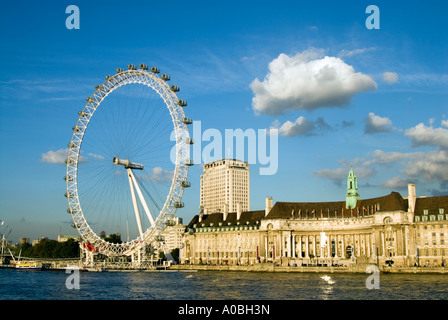 The London Eye and County Hall on the river Thames, England UK Stock Photo