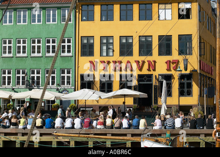 'Nyhavn 17' quayside cafe terrace, Nyhavn, Copenhagen, Denmark Stock Photo