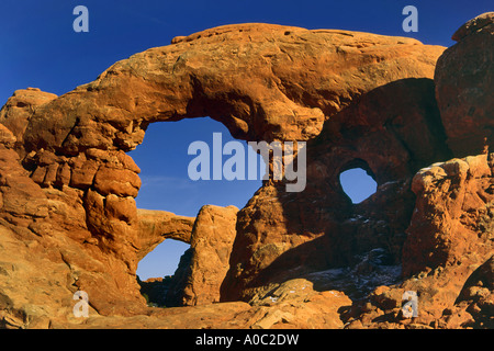 Turret Arch, South Window in dist, winter, Arches Nat Park, Utah, USA Stock Photo