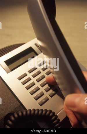 hand operating telephone Stock Photo