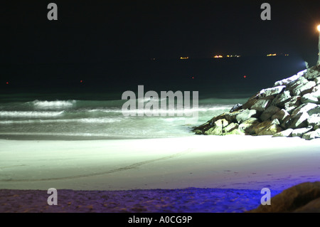 Jumeira beach floodlit in blue at night Dubai Stock Photo