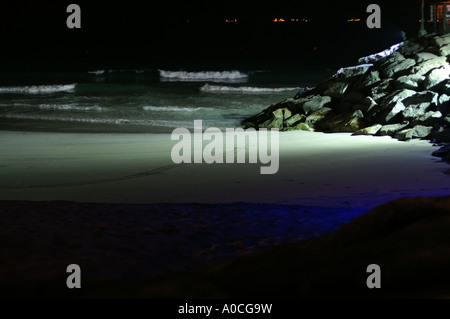 Jumeira beach floodlit in blue at night Dubai Stock Photo