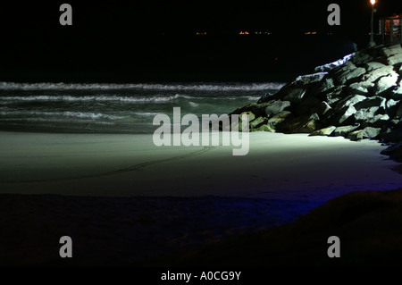 Jumeira beach floodlit in blue at night Dubai Stock Photo