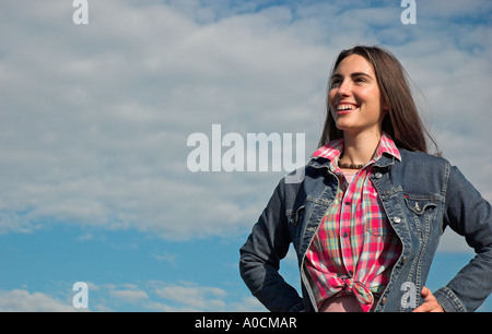 Smiling young woman outdoors Stock Photo