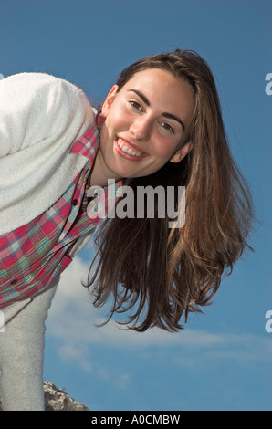 Smiling young woman outdoors Stock Photo