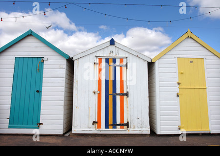 BEACH HUTS ON THE PROMENADE AND MARINE PARADE AT PAIGNTON DEVON UK Stock Photo