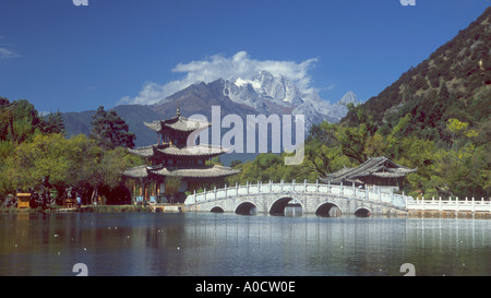 The Moon Embracing Pavilion Black Dragon Park with Jade Dragon Snow Mountain in background Lijiang Yunnan province China Stock Photo