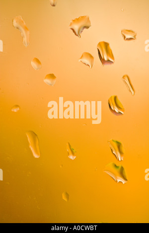 RAINDROPS ON A WINDOW PANE Stock Photo