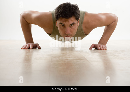 Man doing pushups Stock Photo