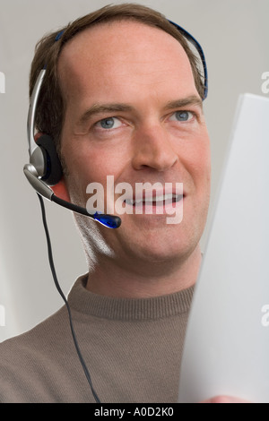 Man wearing headset Stock Photo