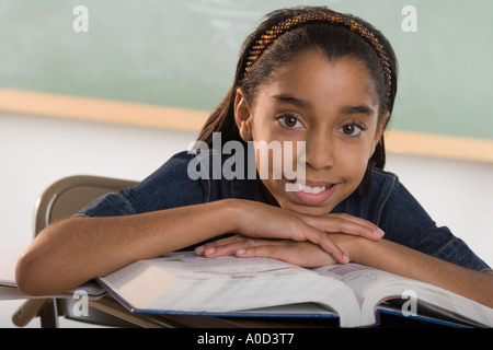 Young girl in classroom Stock Photo