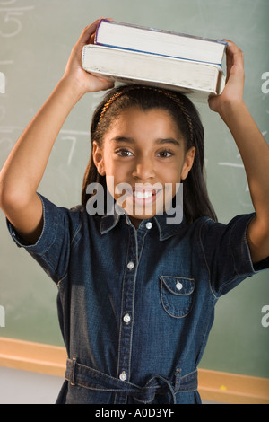 Young girl in classroom Stock Photo