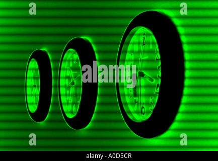 three office wall clocks  set at different times Stock Photo
