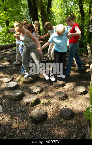 colleagues working together on a team building exercise Stock Photo
