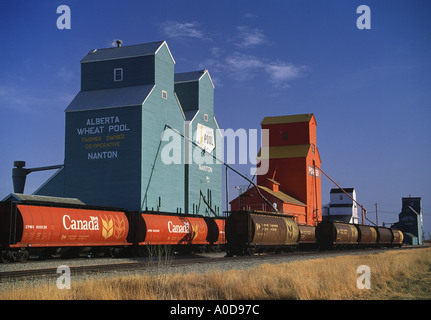 Grain elevators and loading train Nanton Alberta Canada Stock Photo