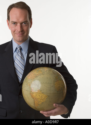 Man holding globe Stock Photo