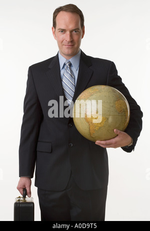 Man holding globe Stock Photo