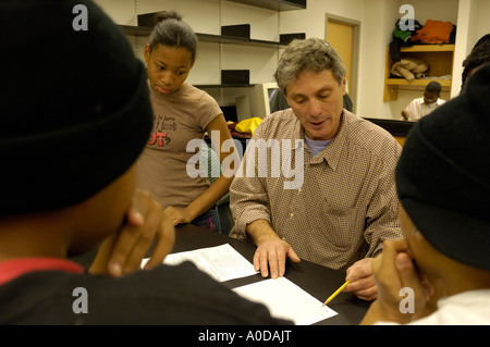 Teacher with middle-school students Stock Photo