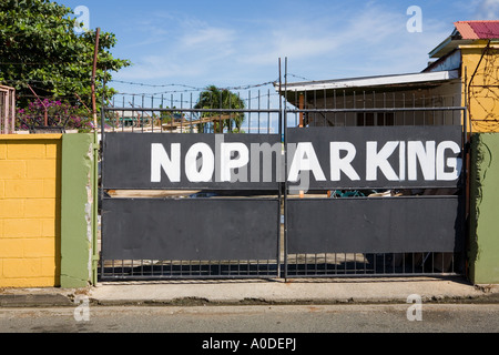 Painted gates with amusing letter spacing, Island of Tobago, Caribbean Stock Photo