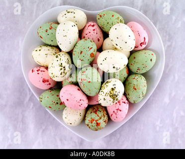 SPECKLED EASTER EGGS IN HEART SHAPED DISH Stock Photo