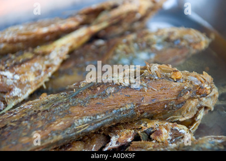 Deep fried fish on sale at a street market in George Town Penang Stock Photo