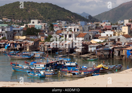 Vietnam Central Nha Trang city Cai River fishing boats and fishermens shanty settlement below Son Mountain Hon Son Stock Photo