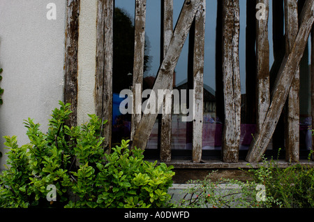 Part of window in old wooden house Stock Photo