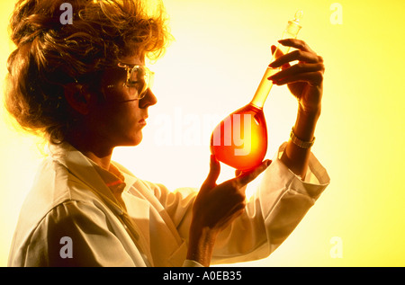 Technician with flask Stock Photo