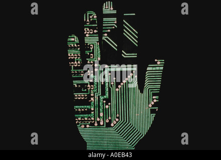 Hand with computer circuitry Model Released Stock Photo