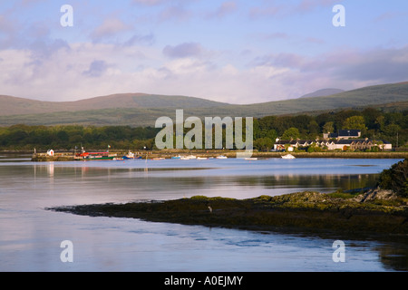 Pier and harbour with moored boats in Kenmare River estuary Kenmare Co Kerry Eire Ireland Stock Photo