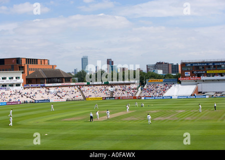 Lancashire and Yorkshire county teams playing cricket at the Old Trafford Ground in Manchester UK Stock Photo