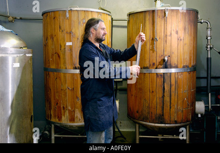 Brewer Chris Gooch in the Teme Valley Brewery behind The Talbot at Knightwick Worcestershire England UK Stock Photo