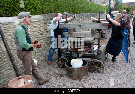 Traditional portable cider press being used at Westons Cider on Big Apple Day Much Marcle Herefordshire England UK Stock Photo