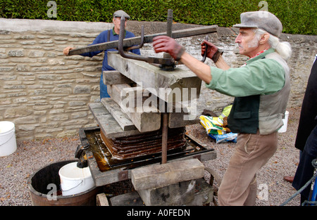 Traditional portable cider press being used at Westons Cider on Big Apple Day Much Marcle Herefordshire England UK Stock Photo