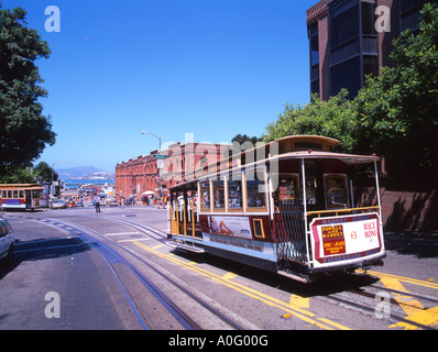 Cable car climbing a hill in San Francisco, California, USA Stock Photo