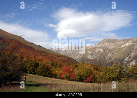 Walker and Monte Sibilla in Italy's Sibillini National Park Stock Photo