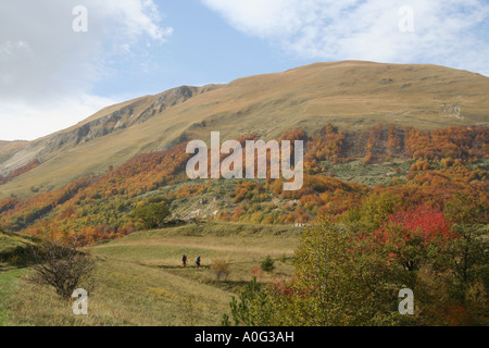 Walkers approaching the hamlet of Altino in Italy's Sibillini National Park, Le Marche Stock Photo