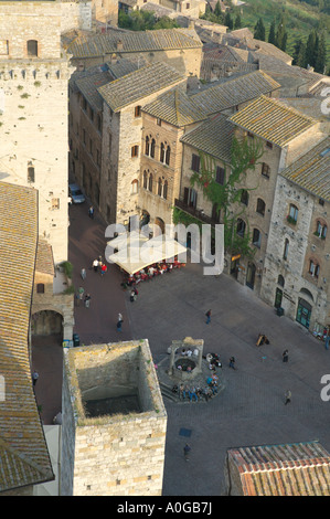 Rooftop view of San Gimignano, Tuscany Italy. Looking down on Piazza della Cisterna from the Torre Grossa Stock Photo