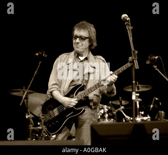 Bill Wyman playing electric bass guitar guitarist Stock Photo