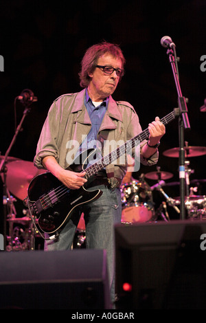 Bill Wyman playing electric bass guitar Stock Photo