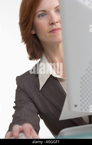 Businesswoman working on computer Stock Photo