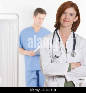 Female doctor smiling confidently Stock Photo