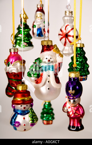 Collection of hanging Christmas decorations. Bought in Krakow Christmas Market, Poland. Snowman, Santa, Boot, tree, soldier, Stock Photo