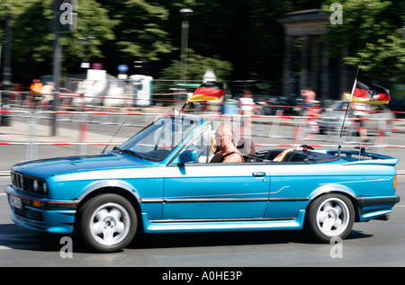 Germany Berlin Summer German cars flying the national flag during the world cup Stock Photo