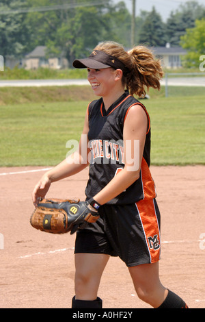 Teenage female Major league Softball action Stock Photo