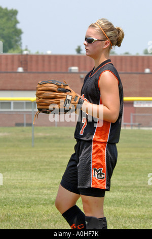 Teenage female Major league Softball action Stock Photo