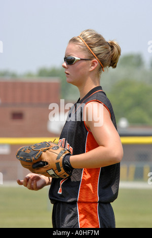 Teenage female Major league Softball action Stock Photo